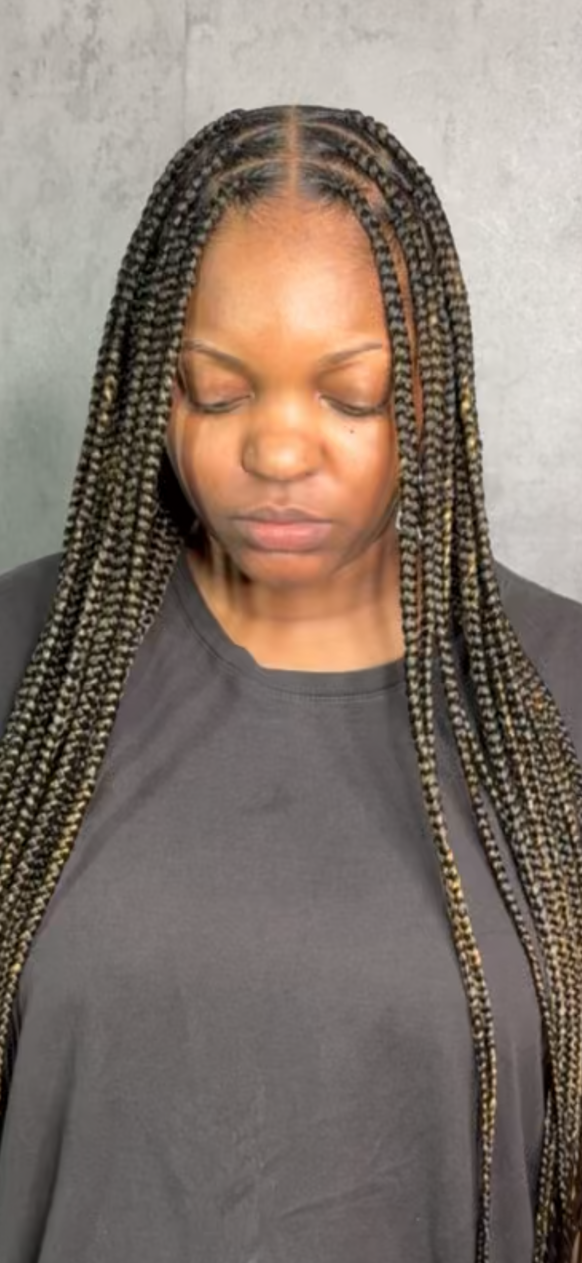 Knotless braids with clean parts and polished finish in Northwest Indiana